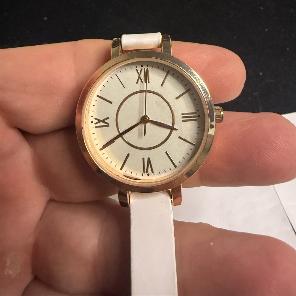 Elegant Gold and White Watch